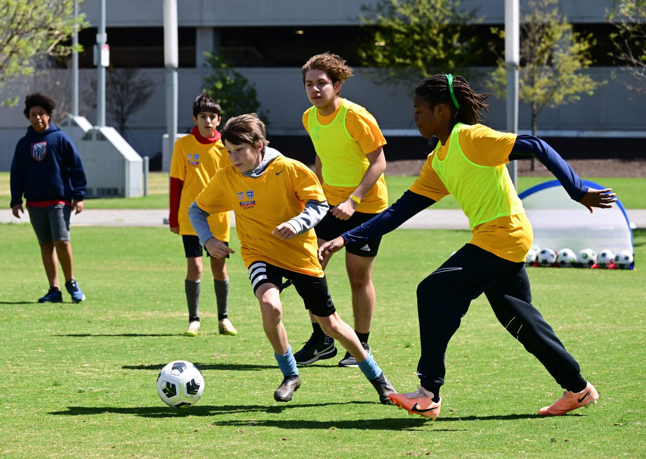 Children play at an AYSO event in Atlanta