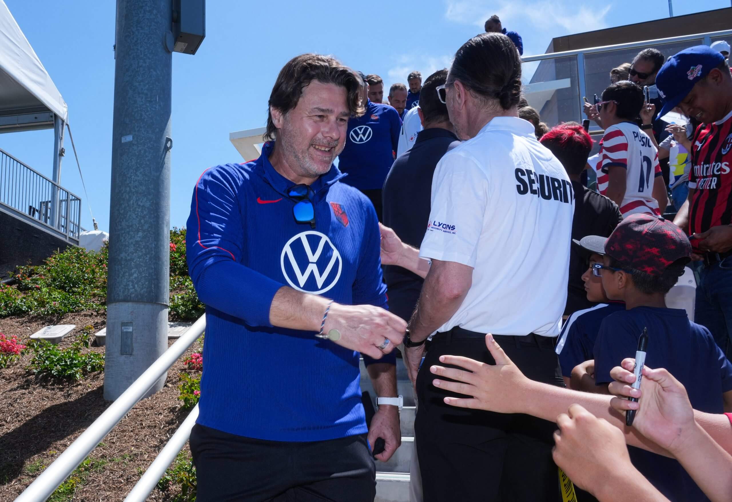 USMNT manager Mauricio Pochettino greets fans