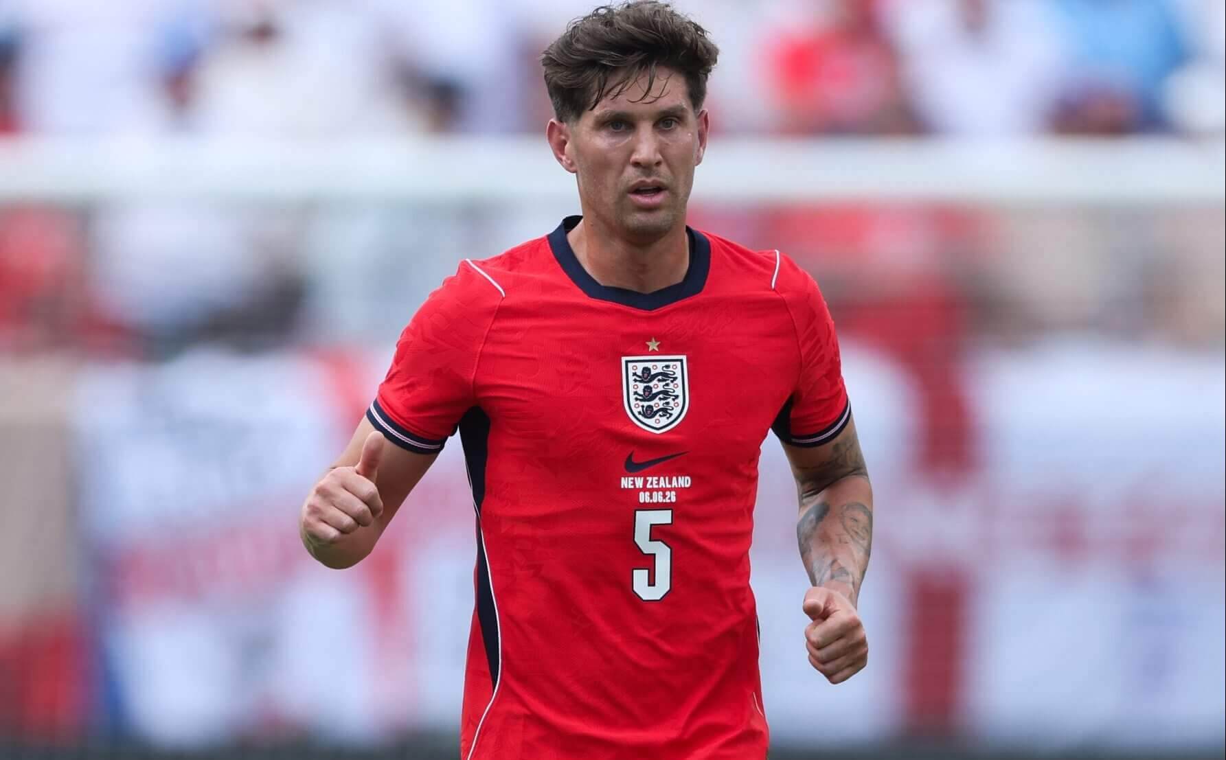 John Stones fotografiado en acción con Inglaterra