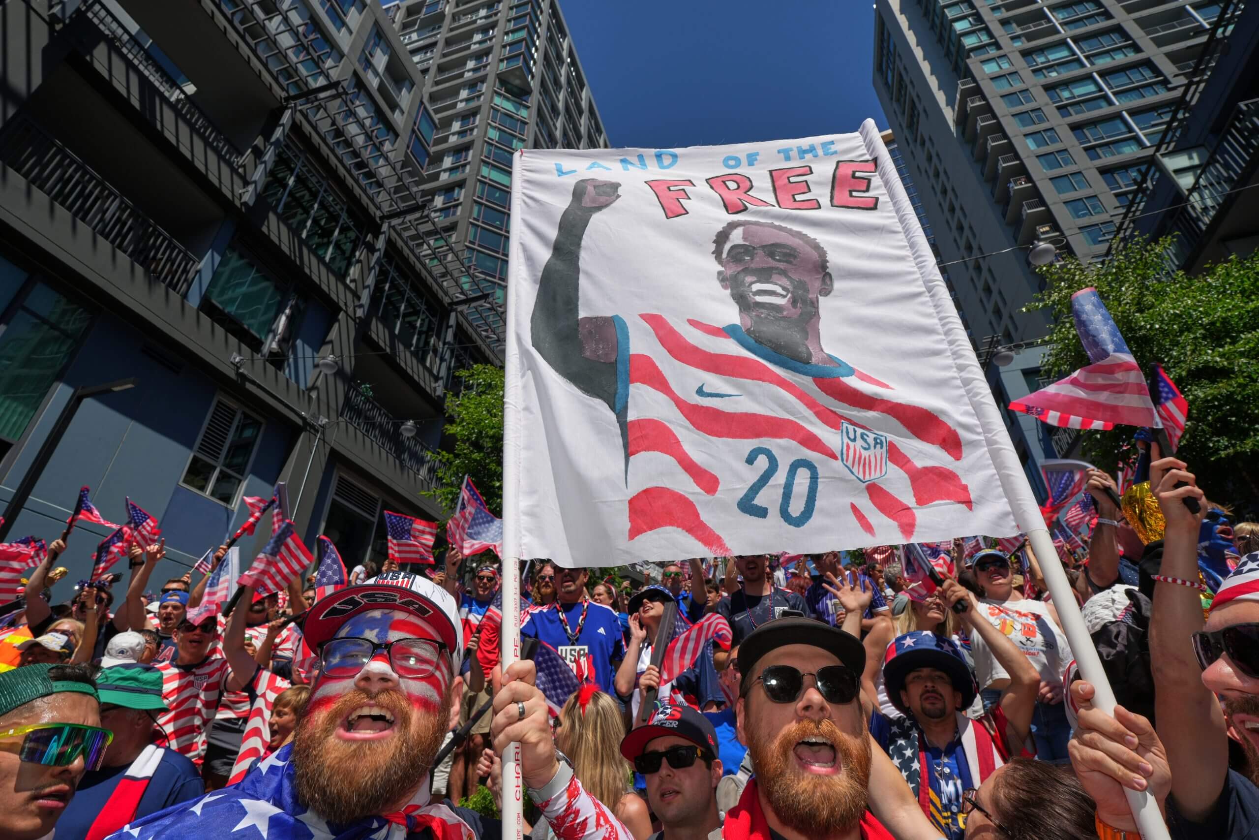 USMNT fans hold a Folarin Balogun sign