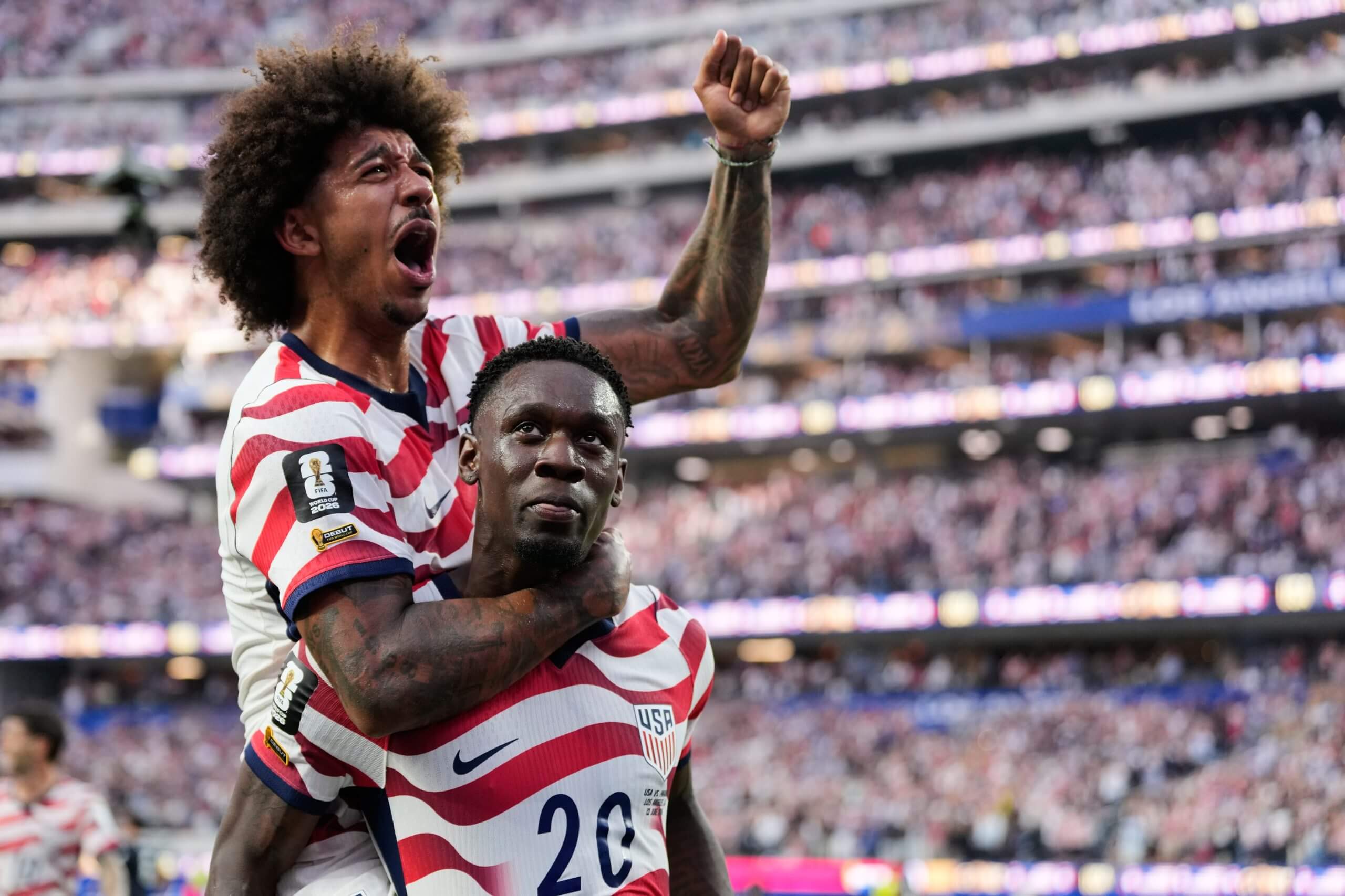 Chris Richards and Folarin Balogun celebrate a goal vs. Paraguay
