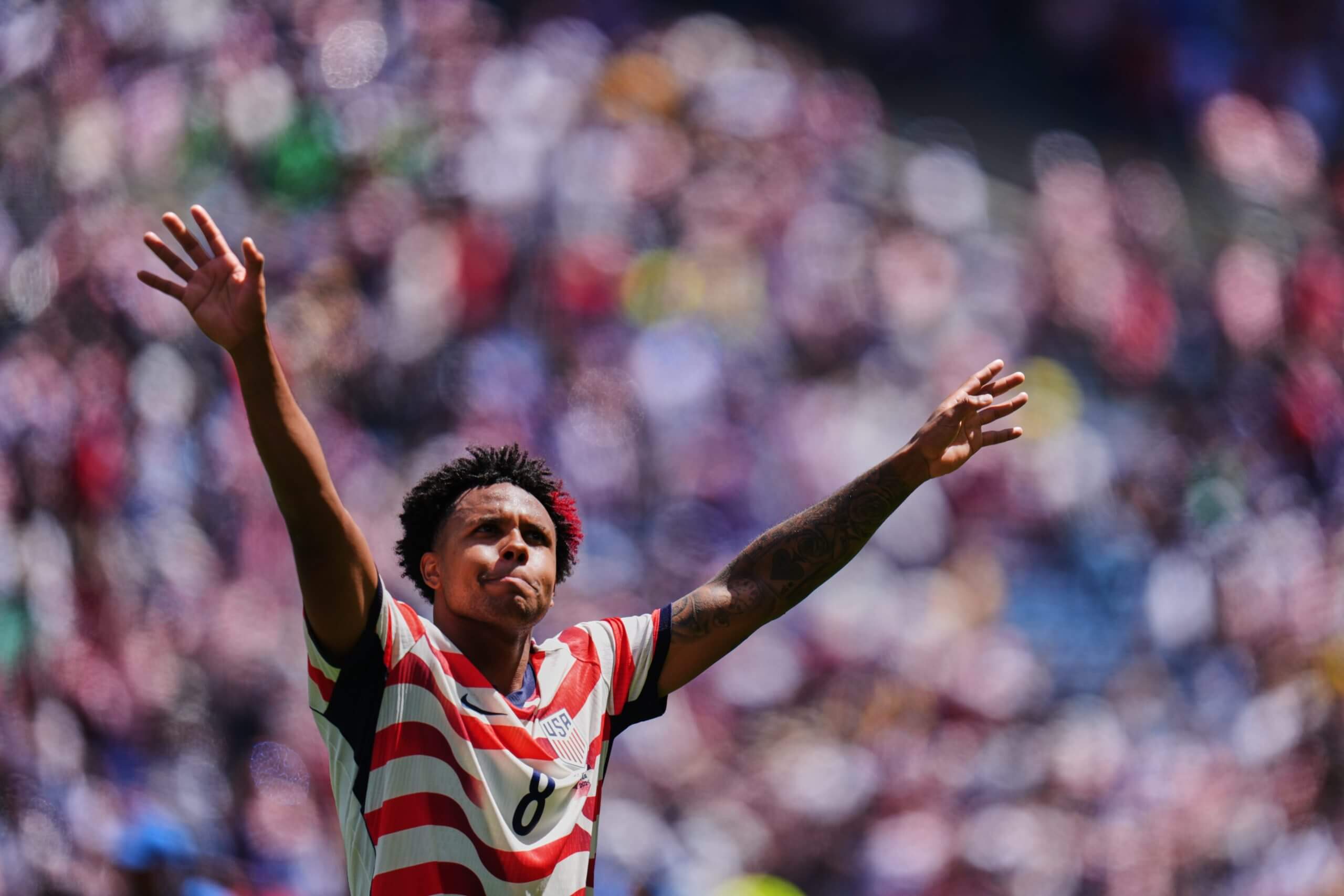Weston McKennie conducts the USMNT crowd