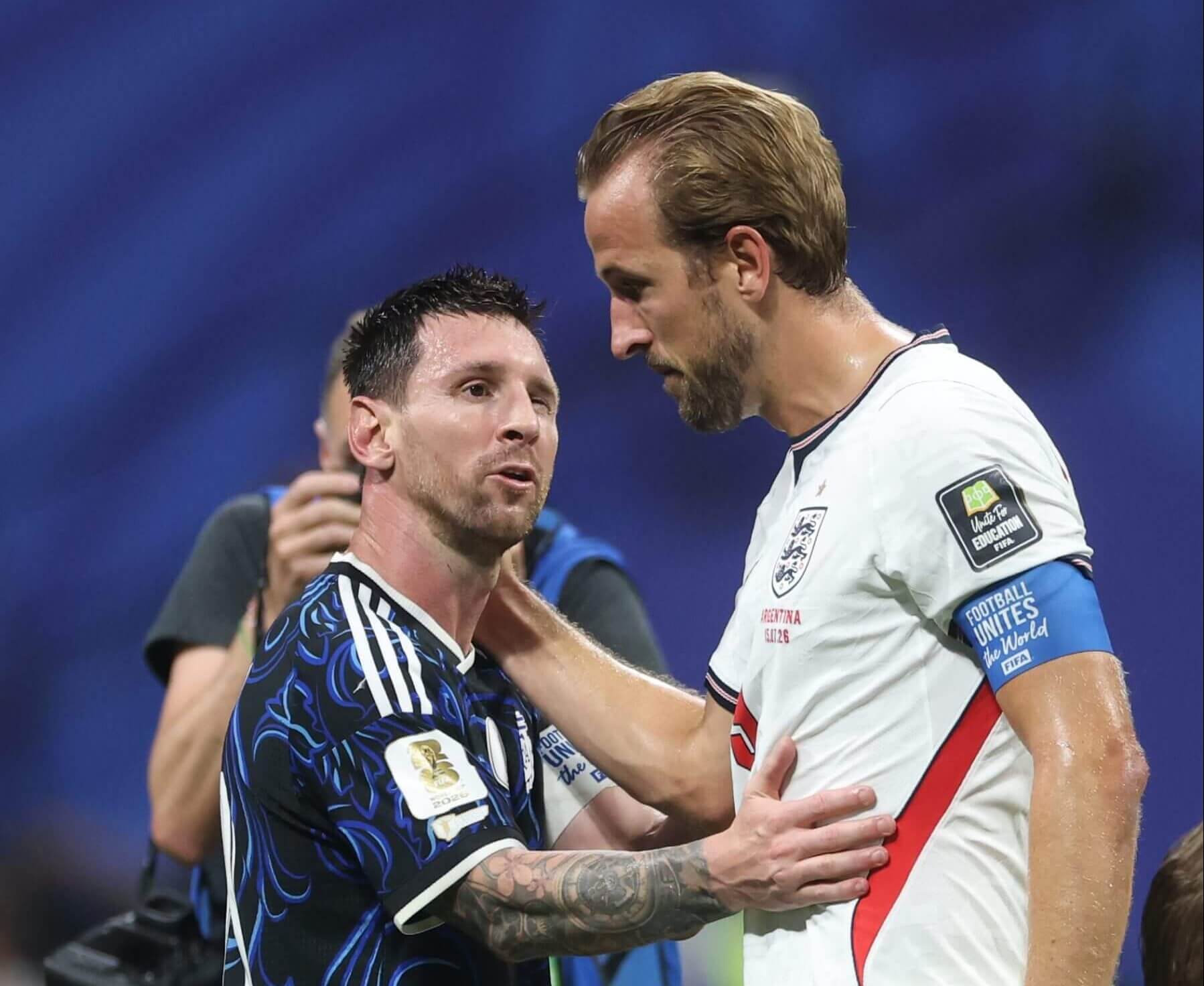 A dejected Harry Kane congratulates Lionel Messi at the final whistle