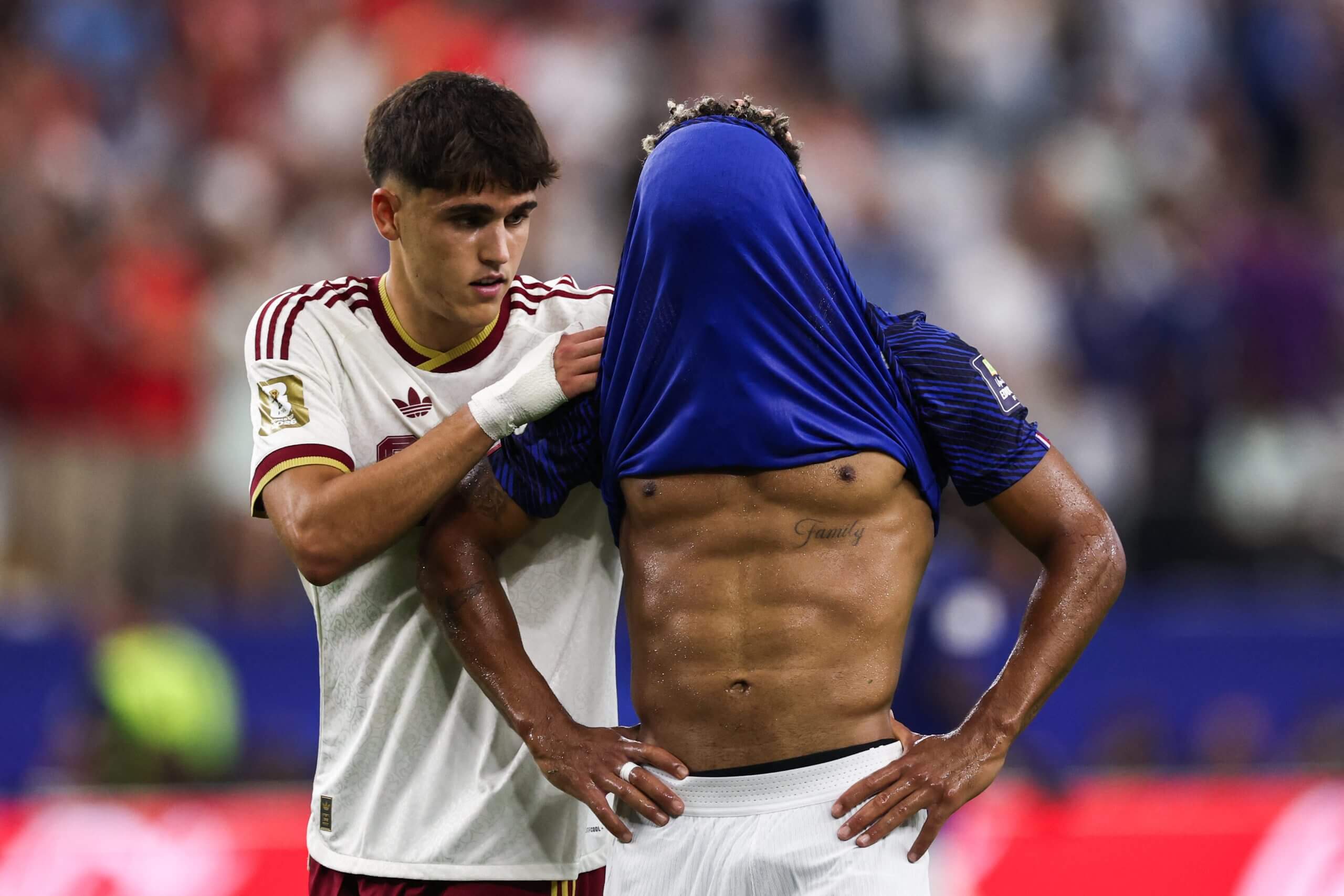 Pau Cubarsi consoles Desire Doue after Spain's victory in the semi-final