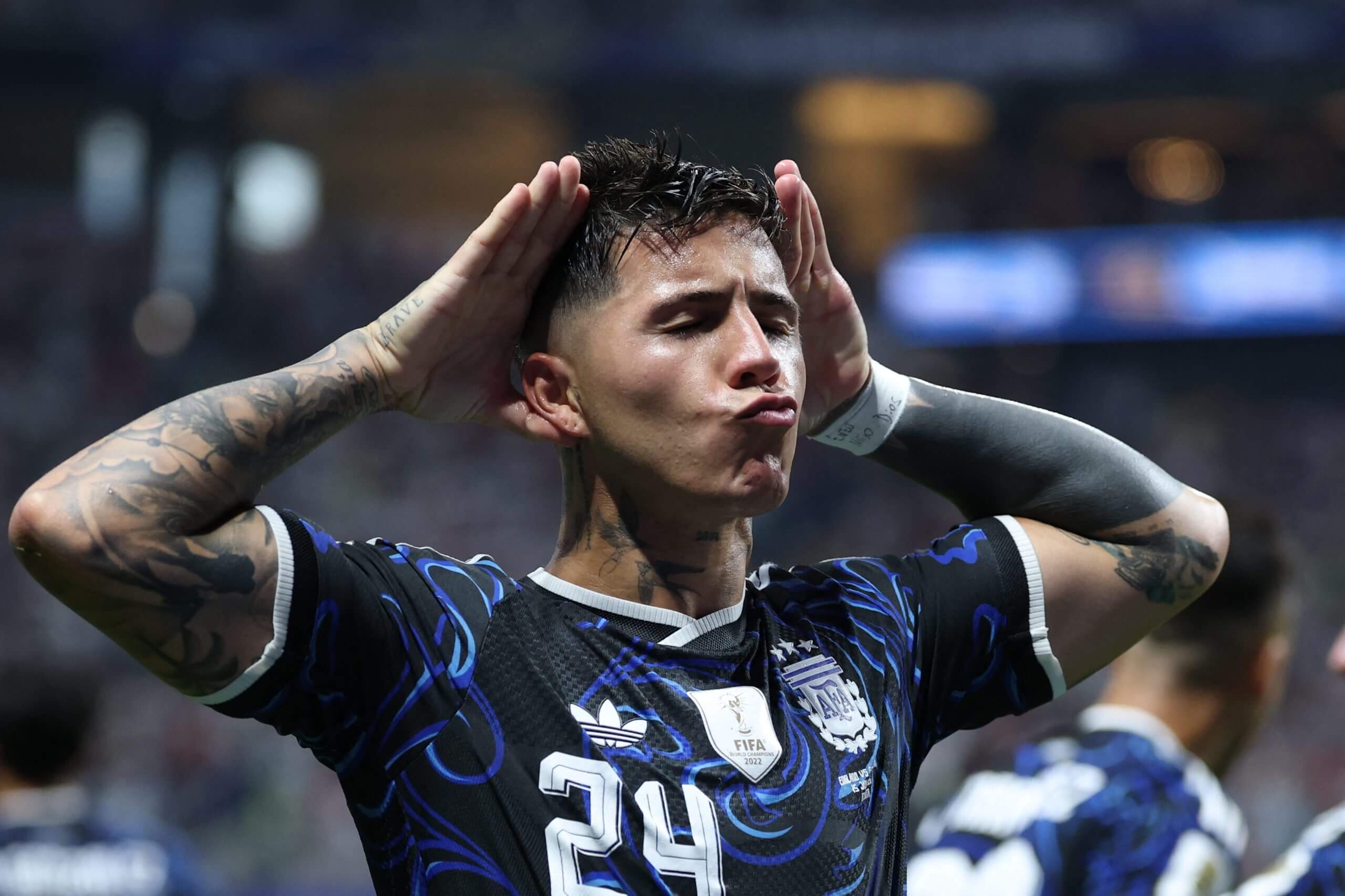 Enzo Fernandez cups his ears in celebration after scoring Argentina's equaliser in the semi-final