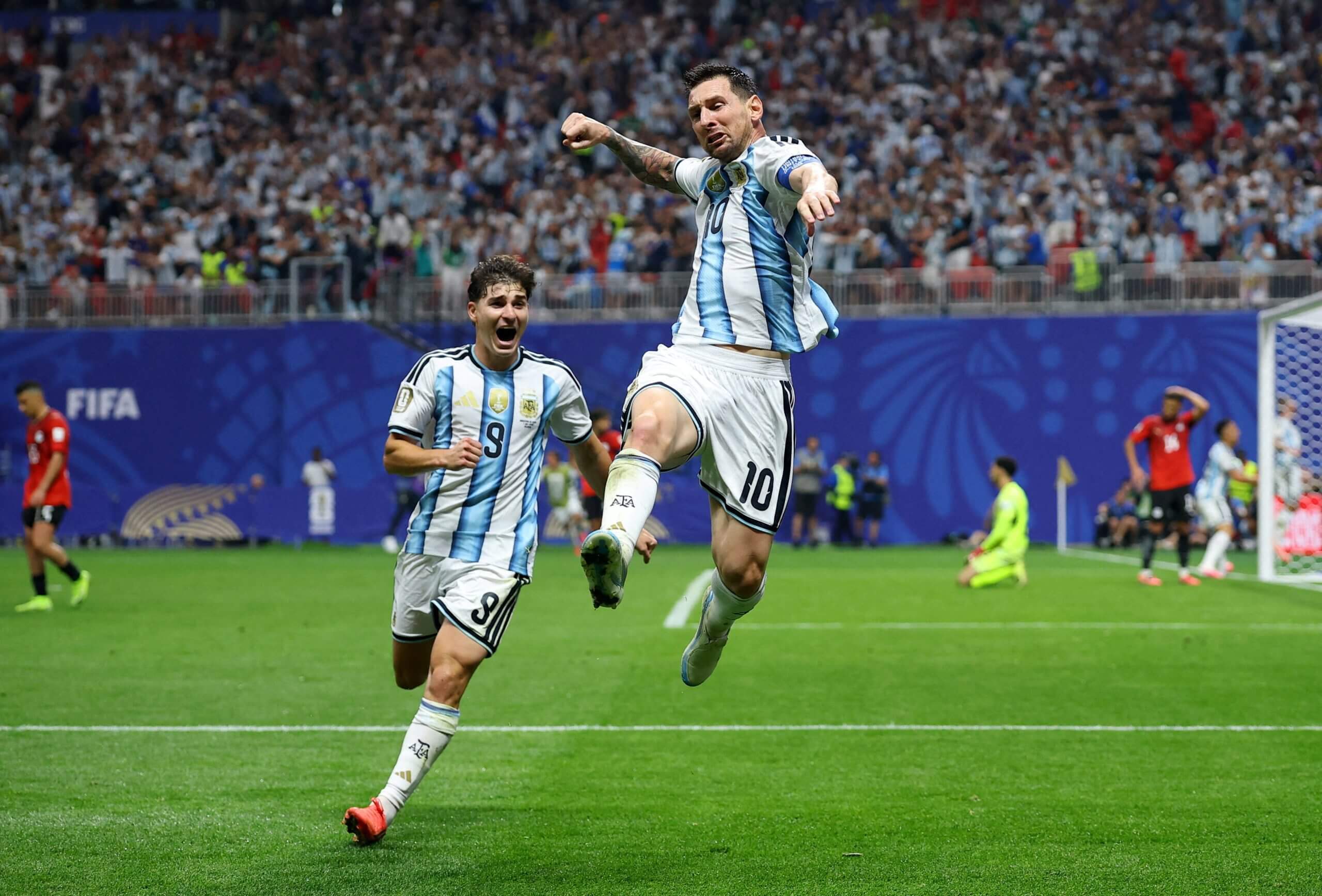 Lionel Messi celebrates Argentina's goal vs Egypt