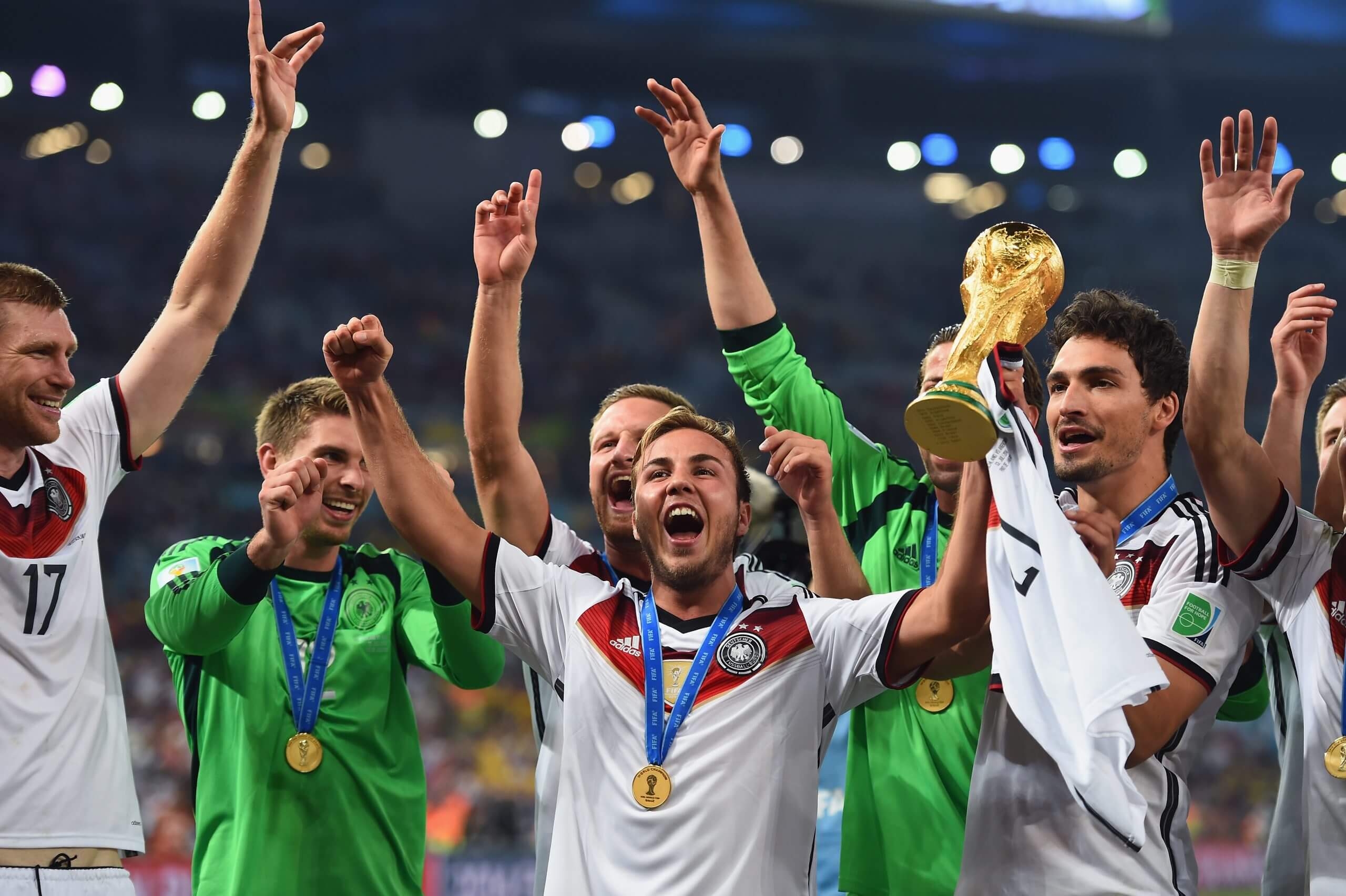 Footballers celebrate winning the World Cup